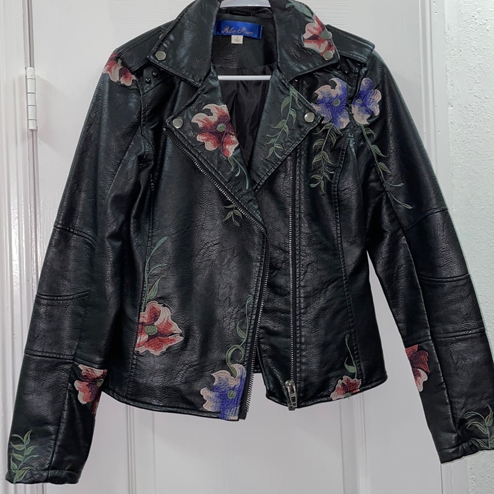 Black leather moto jacket with embroidered flowers